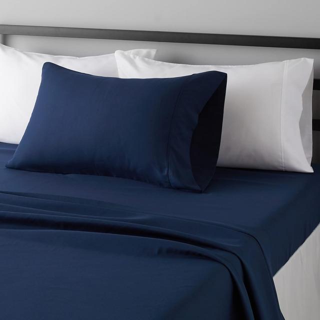 Product image of Amazon Basics Lightweight Super Soft Easy Care Wrinkle Free Microfiber 3 Piece Bed Sheet Set with 14-Inch Deep Pockets, Twin, Navy Blue, Solid, Kids, Men & Women Bedding