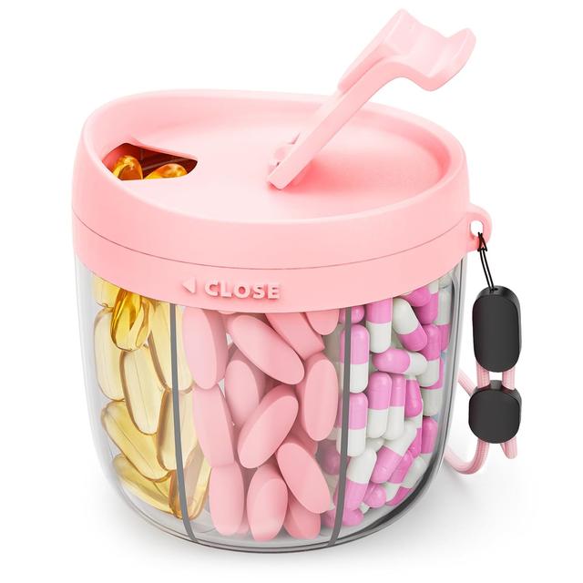 Product image of Cute Pill Dispenser with 7 Large Compartments, Portable Pill Bottle Organizer with Wide Opening for Easy Use, Anti-Mix Pill Organizer for Travel, BPA-Free Pill Container, Pink