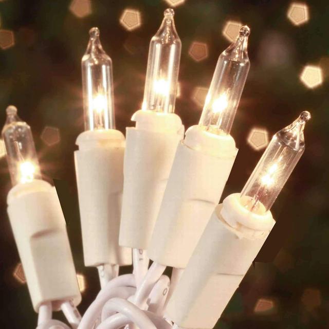 Product image of Christmas Lights 100 Count Mini Clear Lights 21ft White Wire Christmas Tree String Lights Set for Outdoor Indoor Christmas Decorations Wedding Decorations Valentines Day Decor,UL Certified (21feet)