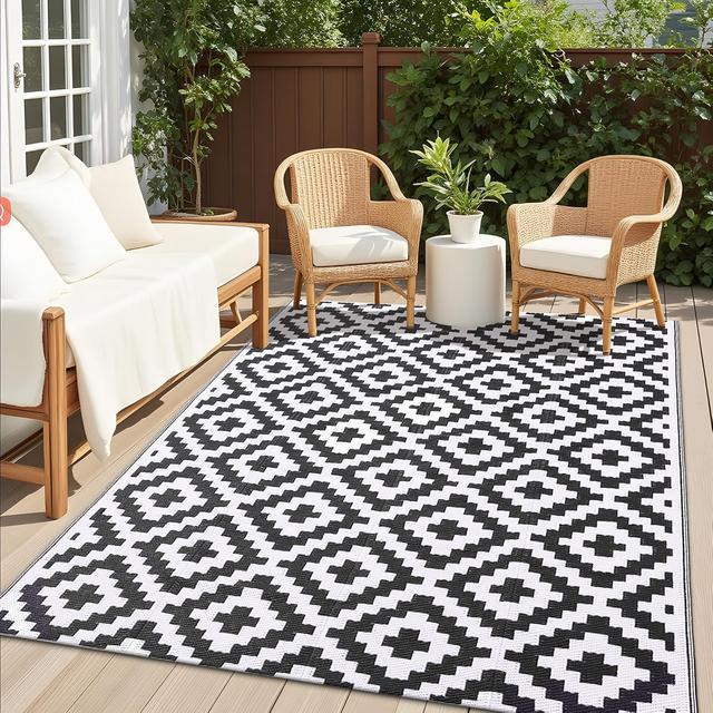 Product image of OLANLY Waterproof Outdoor Rug 5x8 ft, Outdoor Plastic Straw Rug for Camping, RV Mat Outside, Indoor Outdoor Carpet for Porch, Deck, Backyard, Balcony, Picnic, Black & White