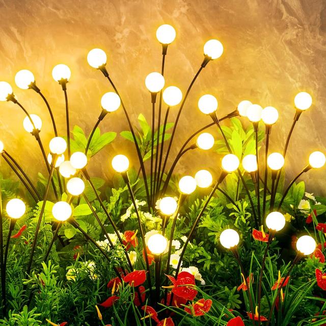 Product image of Solar Lights Outdoor Waterproof, 4 Packs 32LED, Solar Garden Lights, Patio Lights, Garden Decor, Patio Decor, Firefly Lights Solar Outdoor, Unique Gifts for Women, Gifts for Grandma